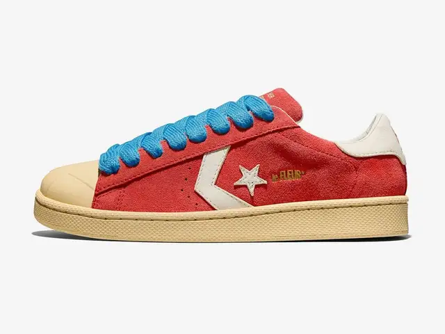 Converse x GOLF le FLEUR* Pro Leather in hot lava, banana, blue, side view