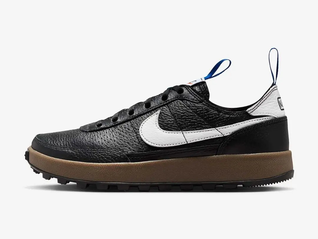 Nike General Purpose in black, team royal, team orange, white, side view