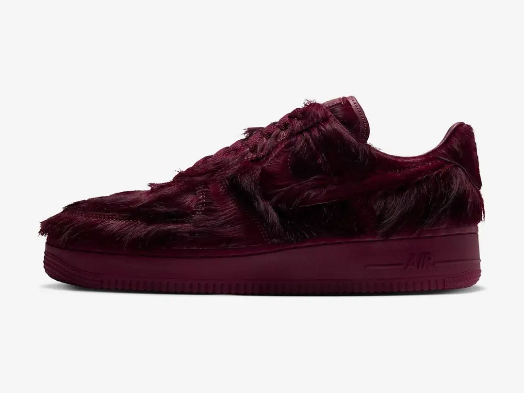 Nike Air Force 1 in team red, team red, team red, side view