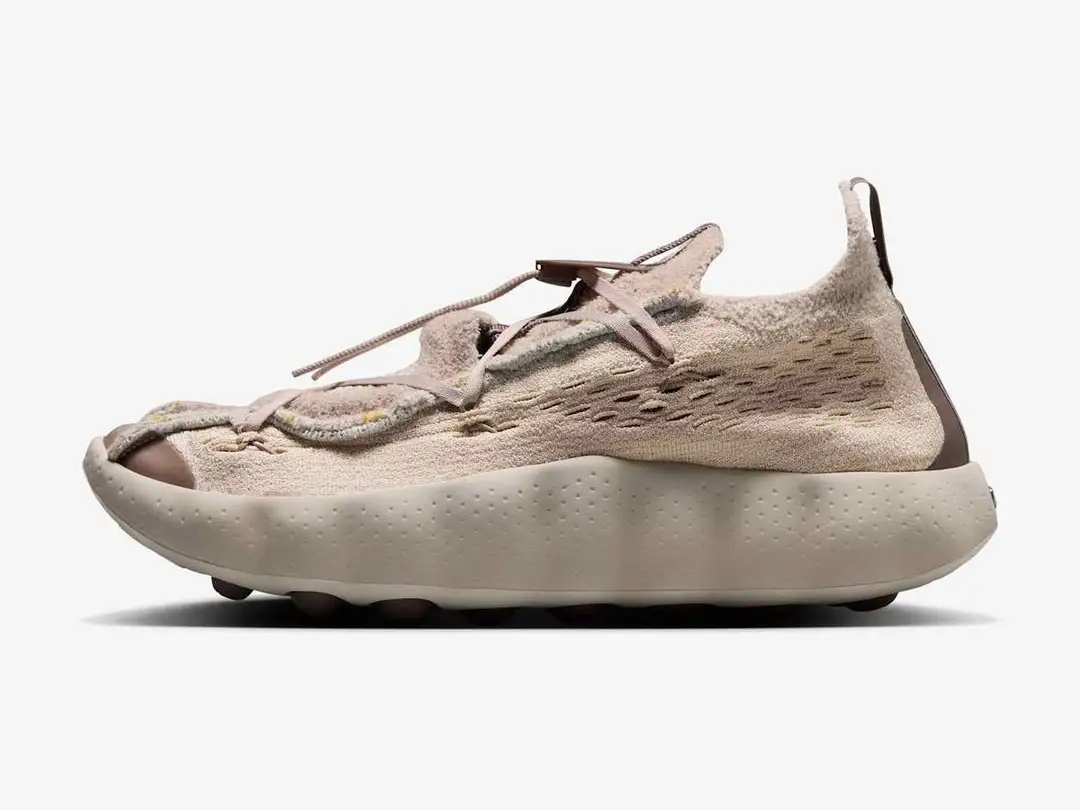 Nike Mind 002 Flyknit in sanddrift, plum eclipse, light orewood brown, fossil rose, side view