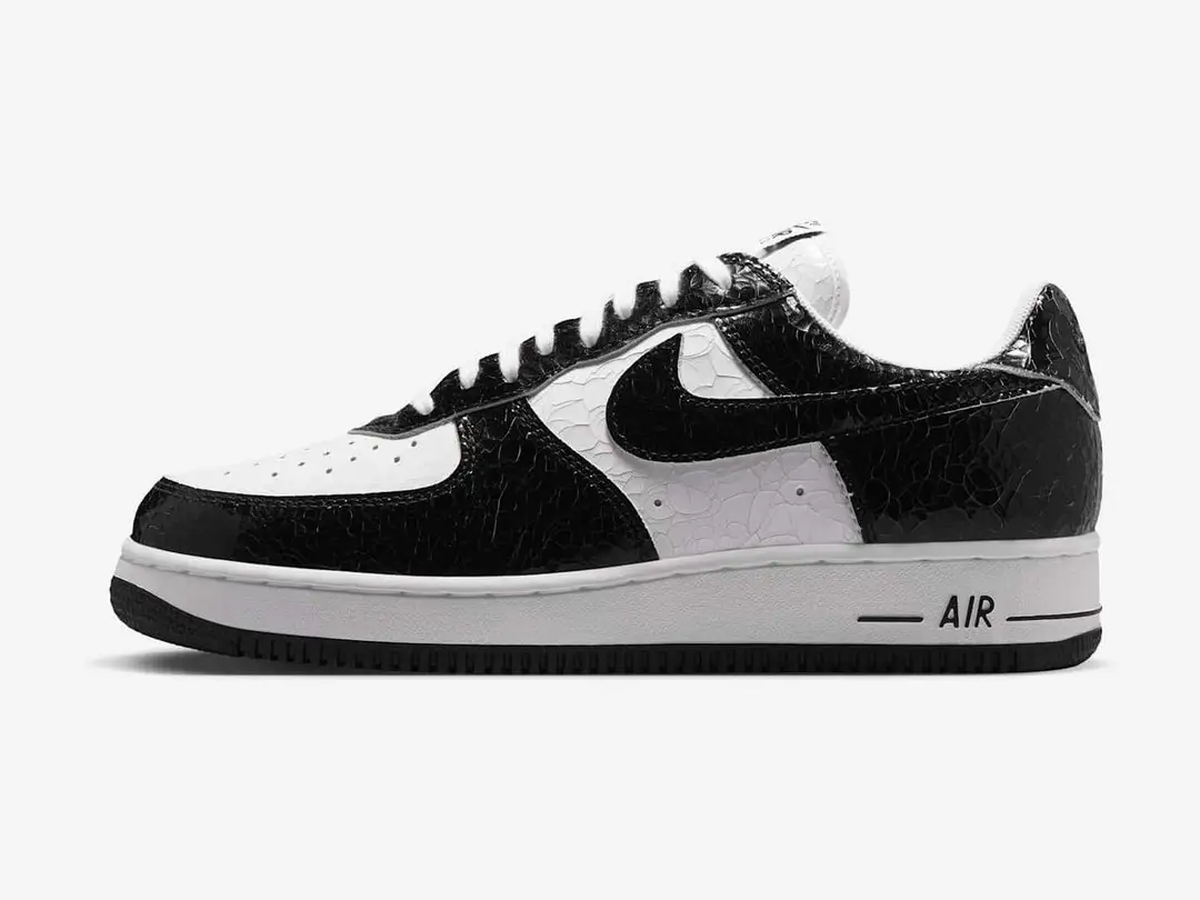Nike Air Force 1 in black, white, black, side view