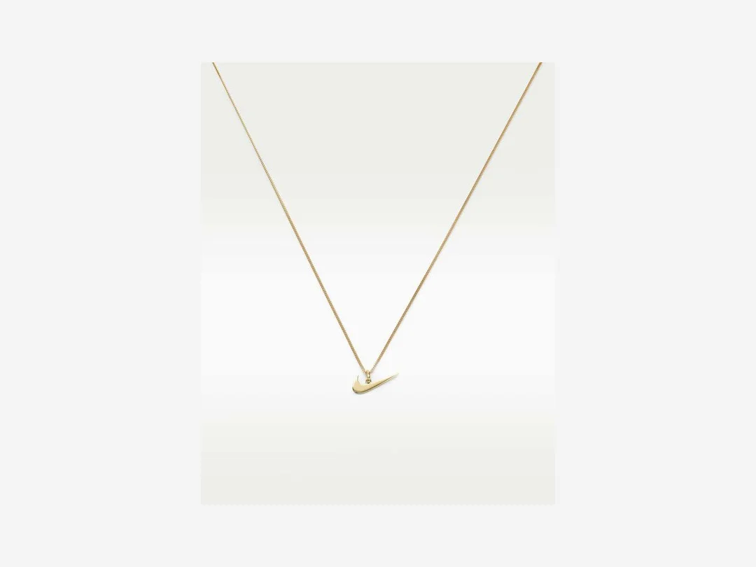 Nike Mini Swoosh Pendant Necklace in gold